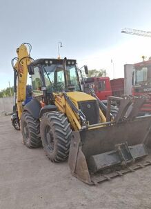 Traktorbager NEW HOLLAND B115B- Lízing na postúpenie