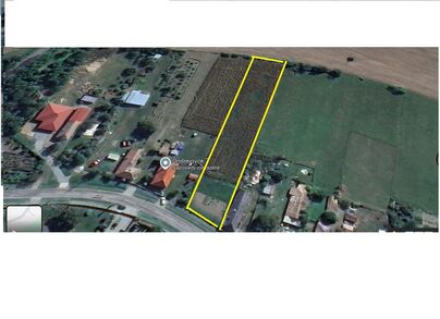 Zľava -  na predaj stavebný pozemok v strede obce Ondrejovce